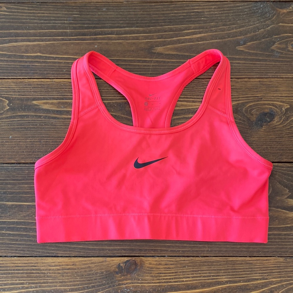 neon pink nike sports bra